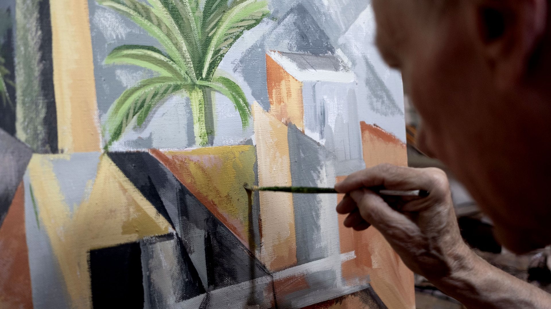 John Myatt painting a Cubist palm-tree scene