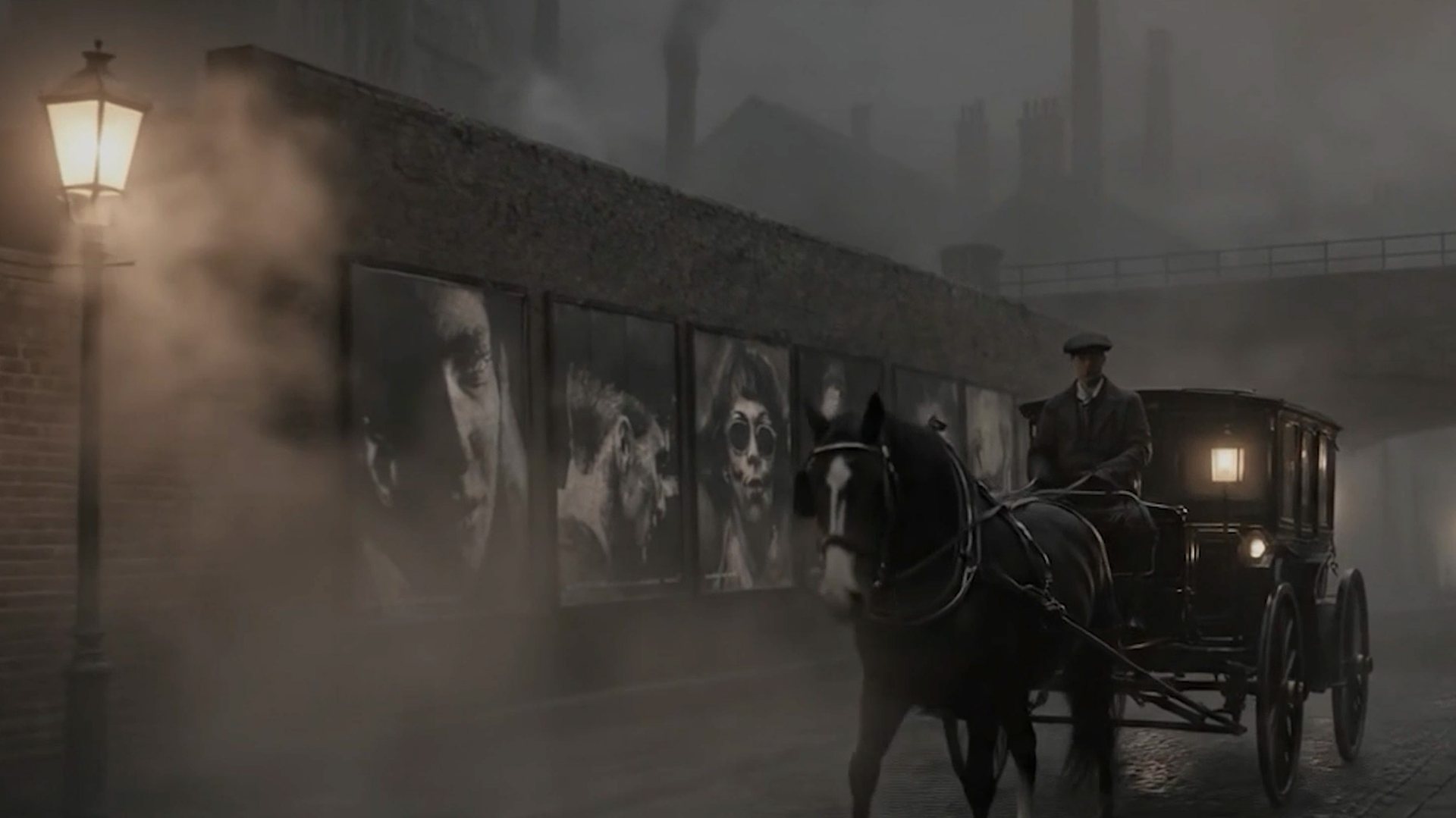 A horse-drawn black carriage passing portraits on a wall in a foggy Victorian street at night