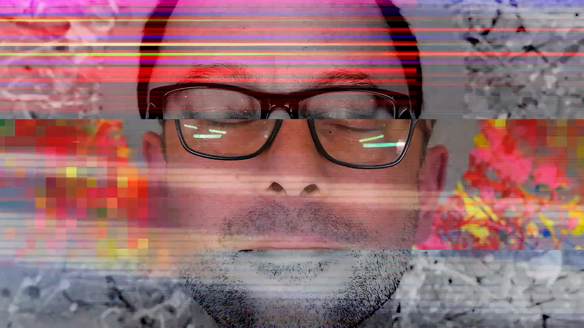 Glitched, colourful close-up of Nic Joly wearing glasses with his eyes closed