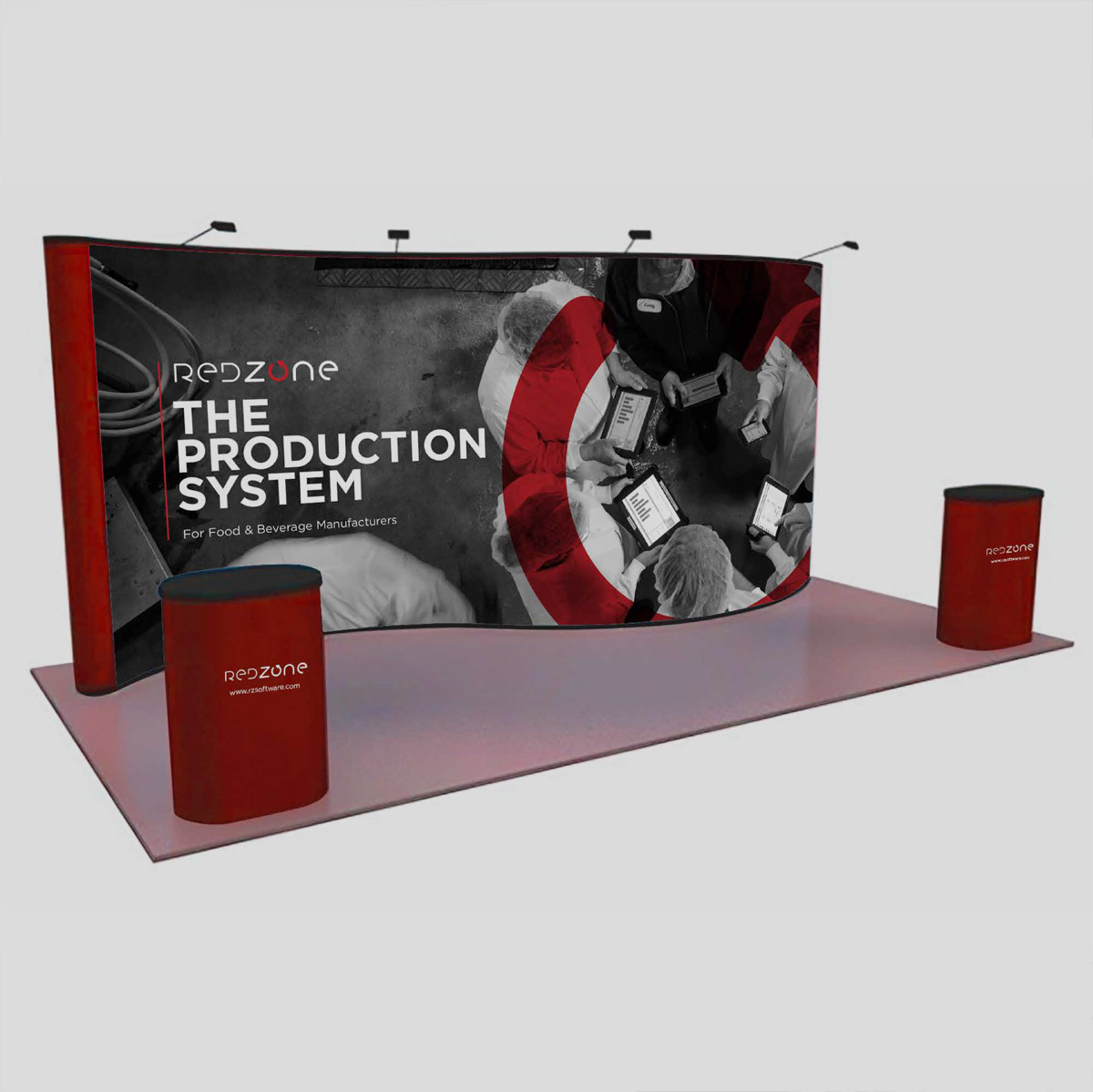 Curved Redzone exhibition stand with ‘The Production System’ graphic and two red counters
