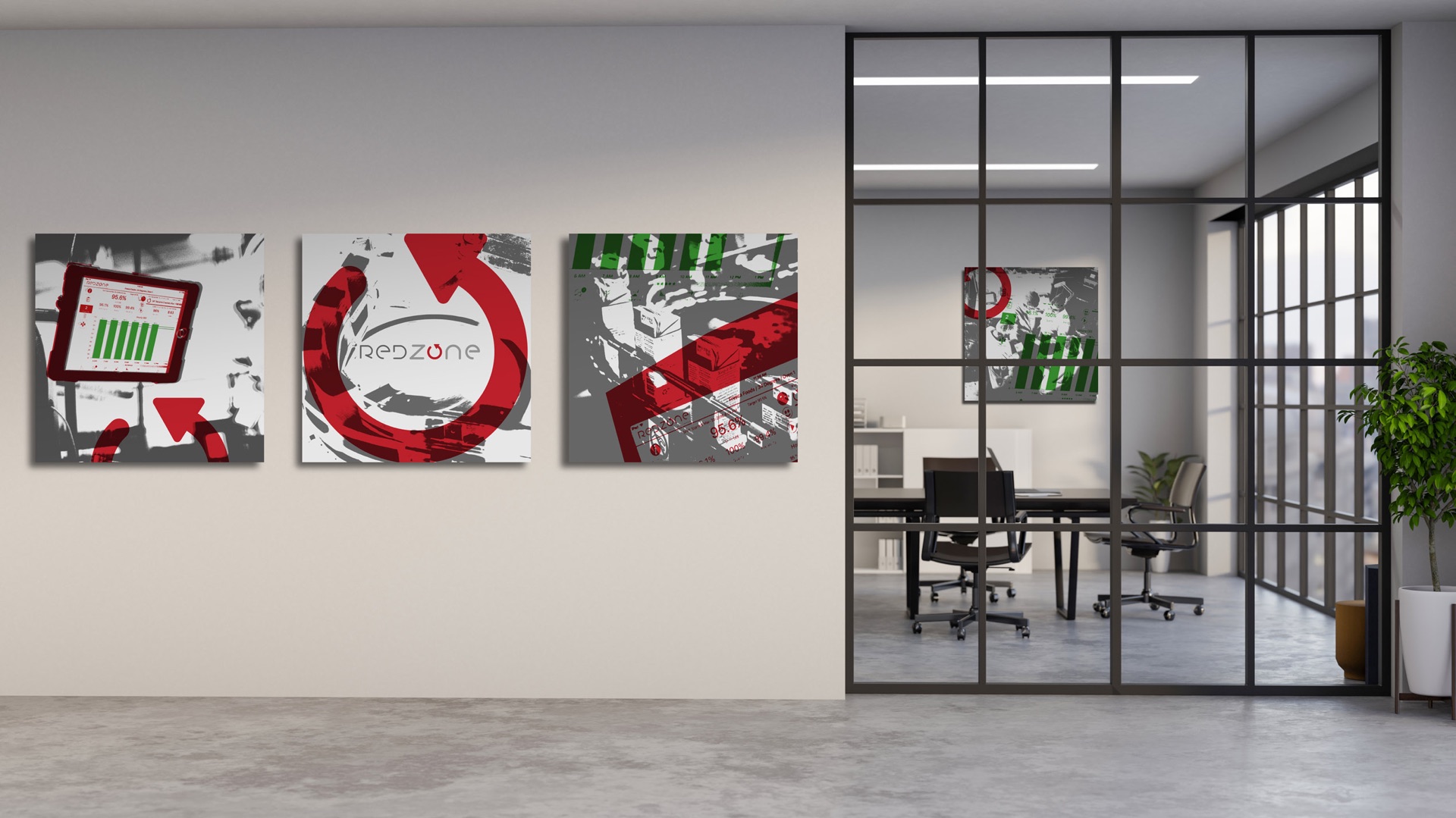 Three square Redzone artworks hung on an office wall beside a glass-walled meeting room