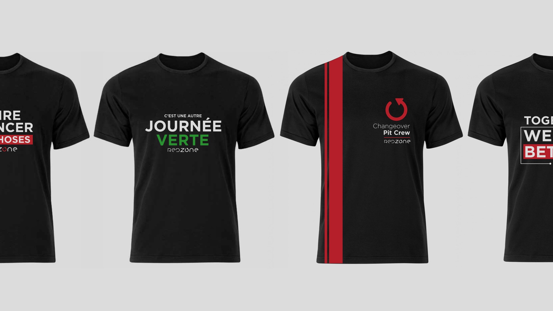 Row of black Redzone T-shirts with slogan prints and a red racing-stripe design